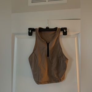 ZARA Athleisure top in muted brown with black zipper.